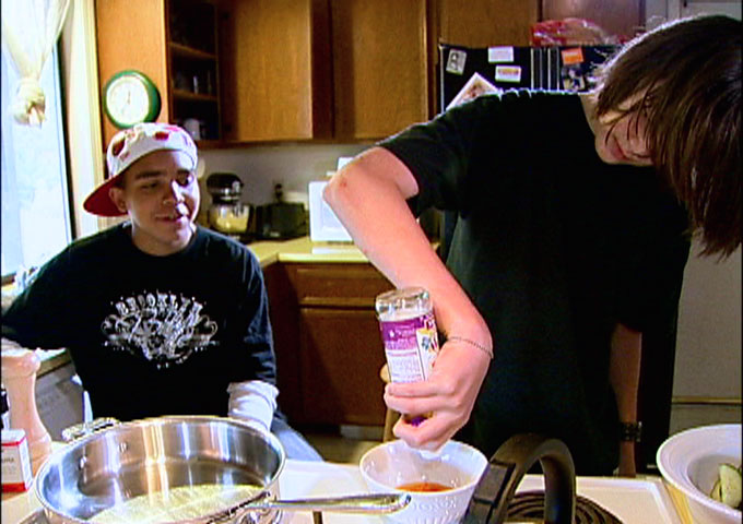 Brad can cook as teenage friend looks on