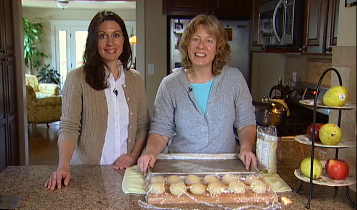 Nicole Rees and Lisa Bell demonstrating how to make east coast bagels.