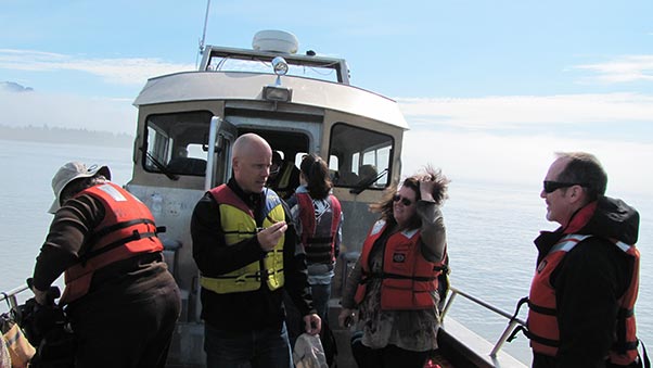 Fellow Travelers and Friends - Foreground Nathan Lyons, Kim Ryals and Ron Ruggles - Cooking Up a Story